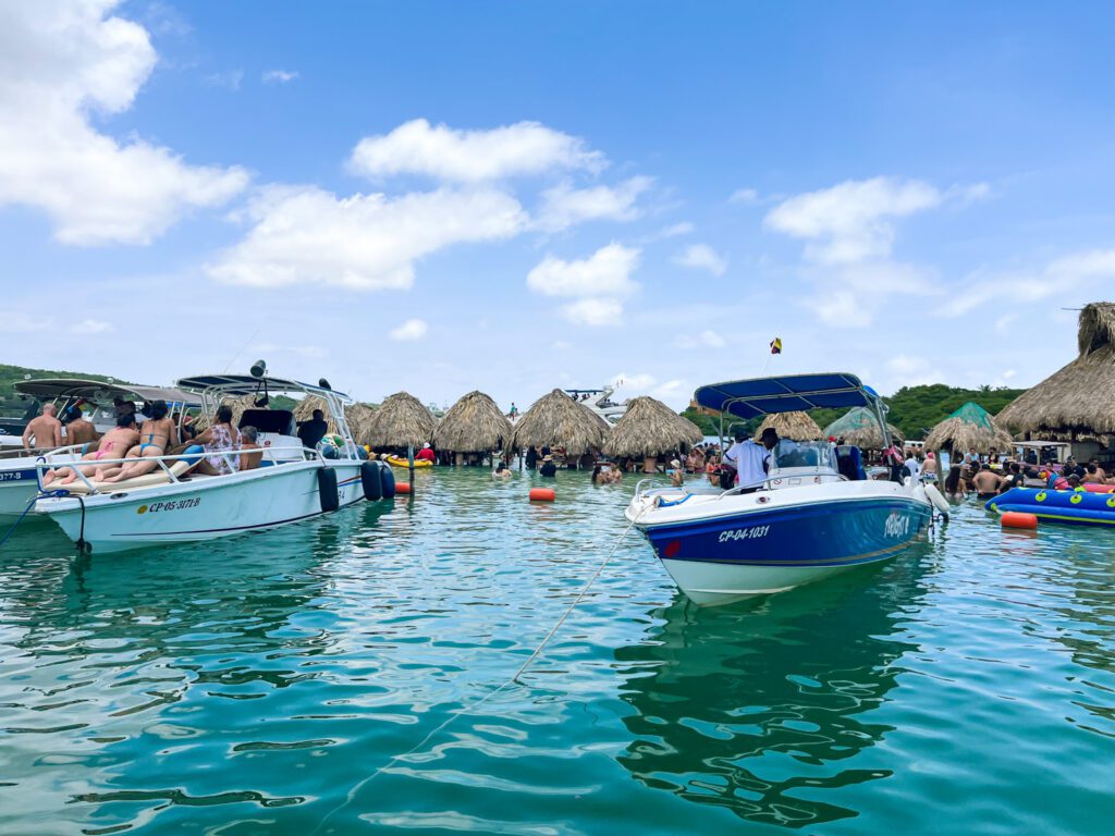 boats docked at a party island off the coast of cartagena