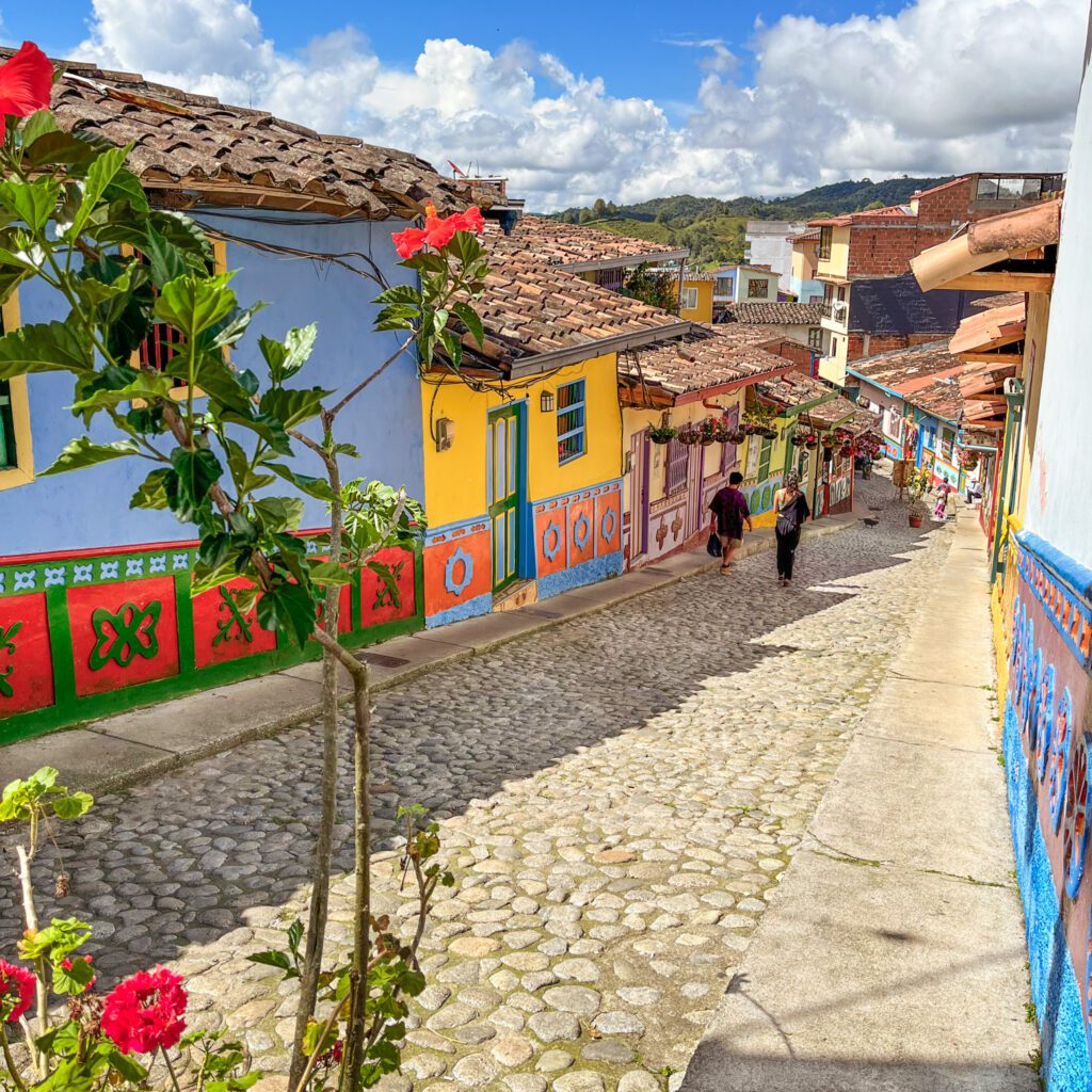 a colorful street in the colonial town of guatape, colombia