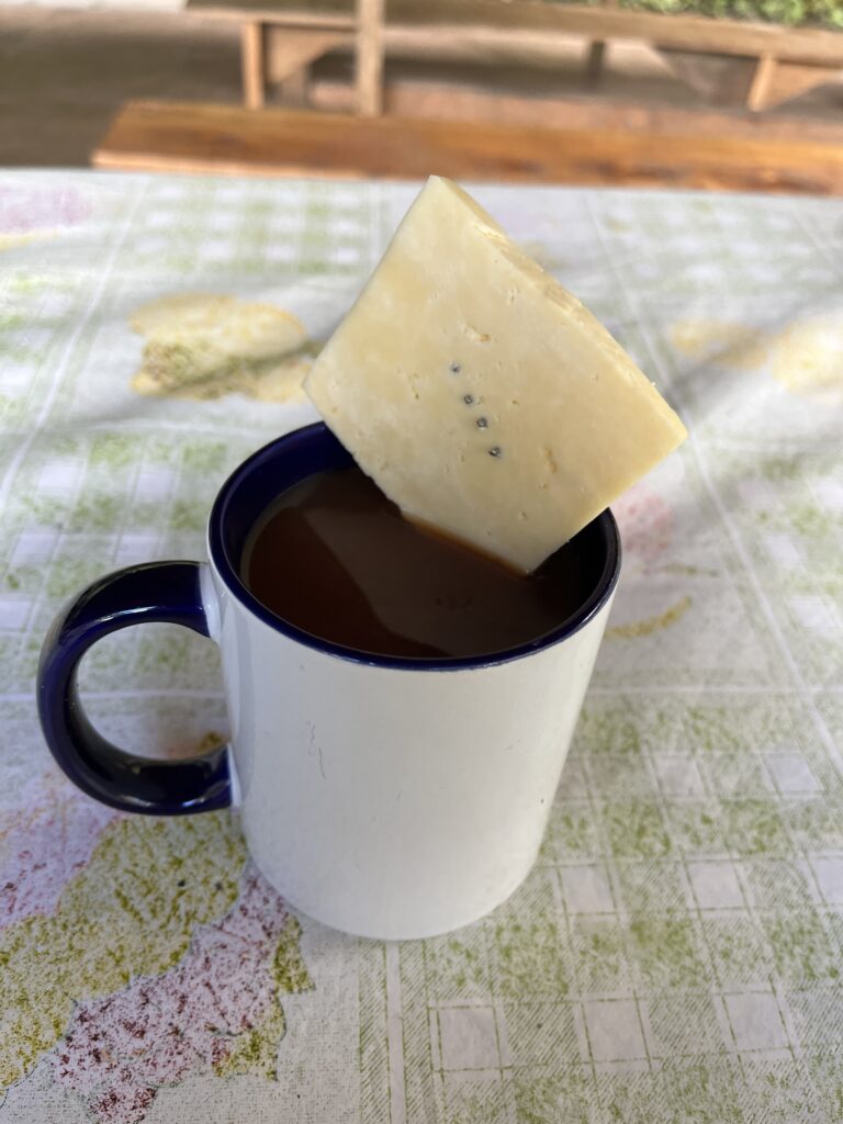 a colombian drink of hot chocolate with cheese