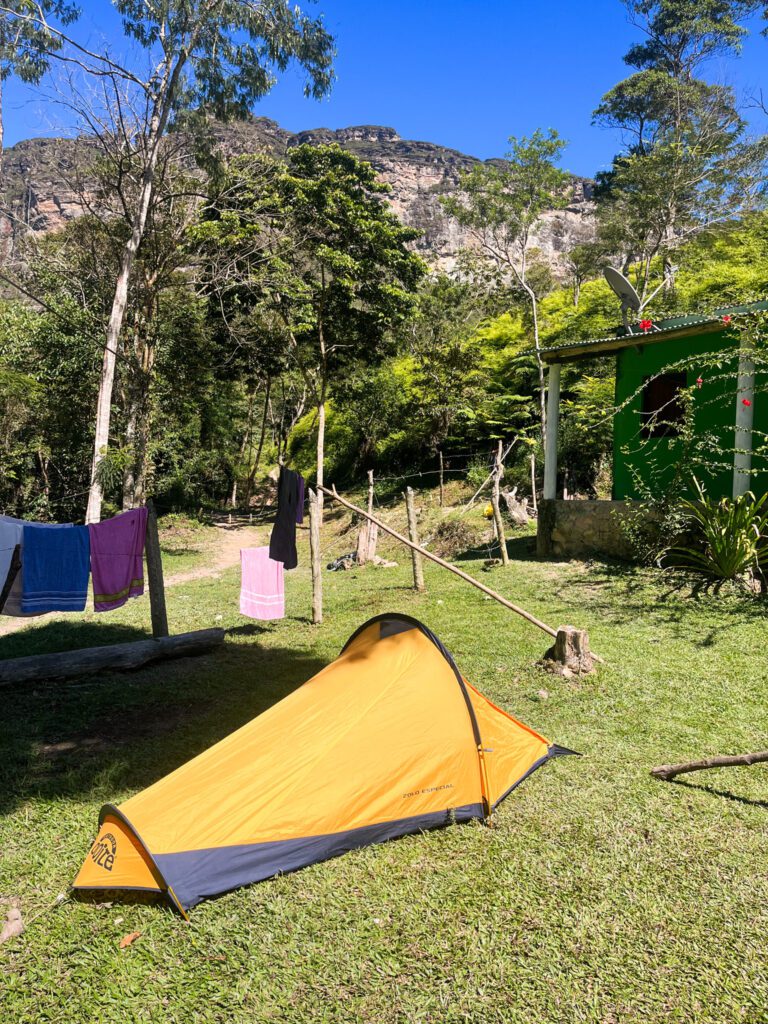 a tent pitched in the garden of a hostel in brazil