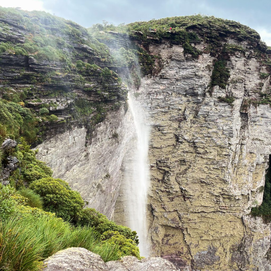 a large, misty waterfall in chapada diamantina, brazil
