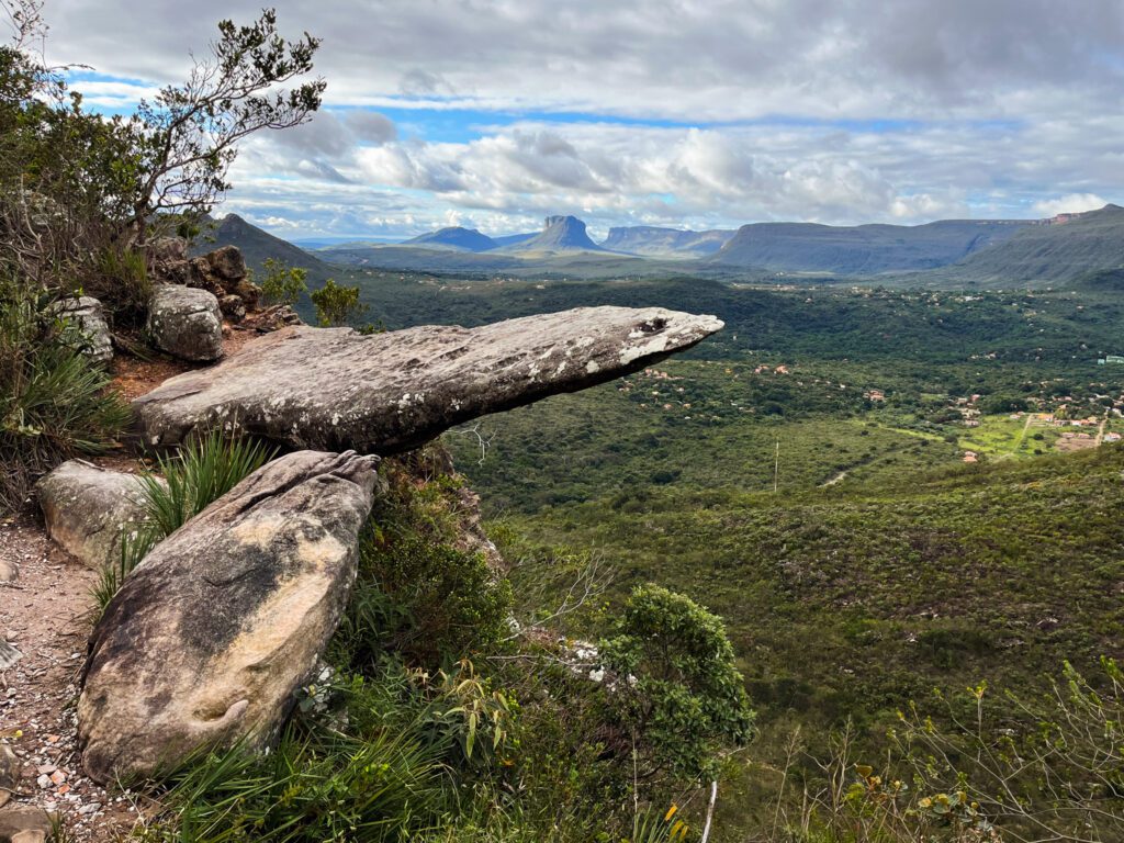 a rocky ledge overlooking vale do capao in brazil