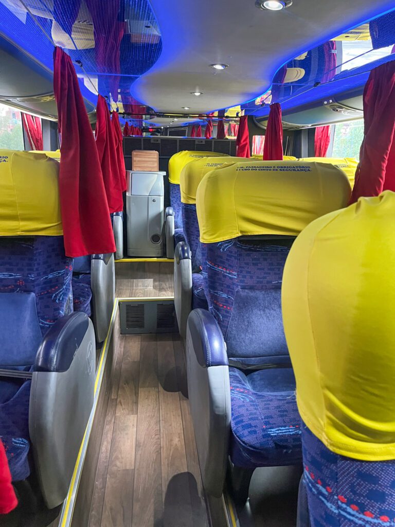 the seats of a spacious night bus.