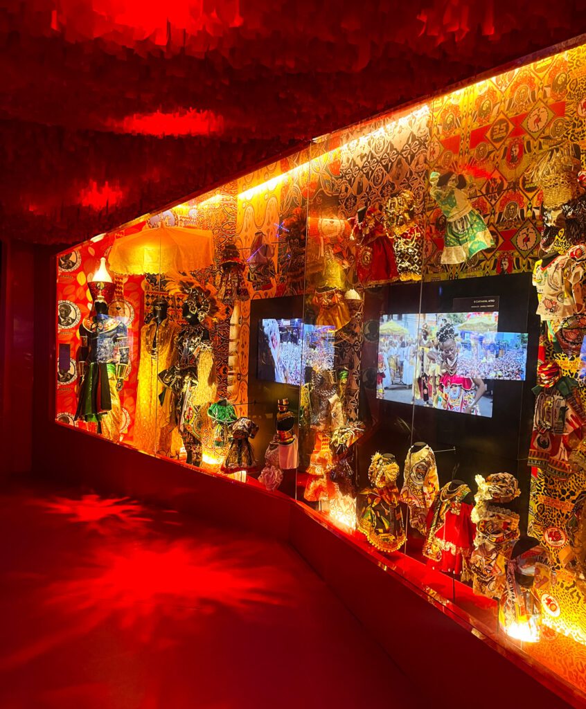 a brightly colored museum exhibit about carnival in Brazil, which is a free travel activity