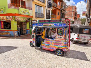 a colorful tuk tuk as a local transportation option in colombia