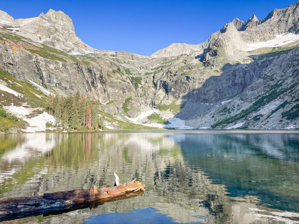 A crystal-clear alpine lake in Sequoia national park in california