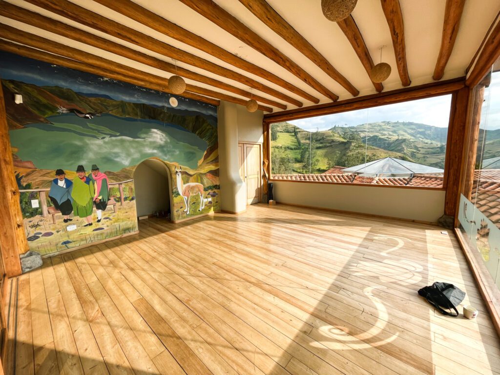 the yoga room of a hostel in the mountains