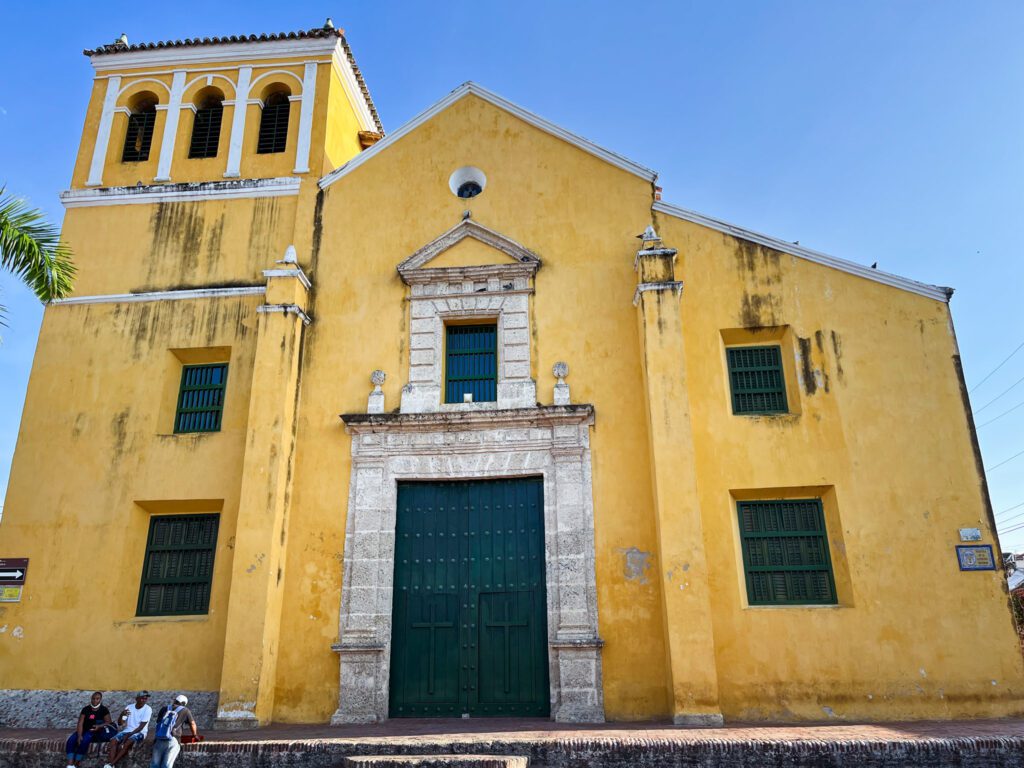 a colonial yellow church in cartagena, colombia