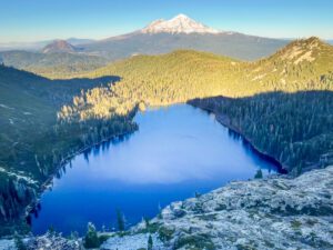 an aerial view of castle lake from the heart lake trail near mt shasta