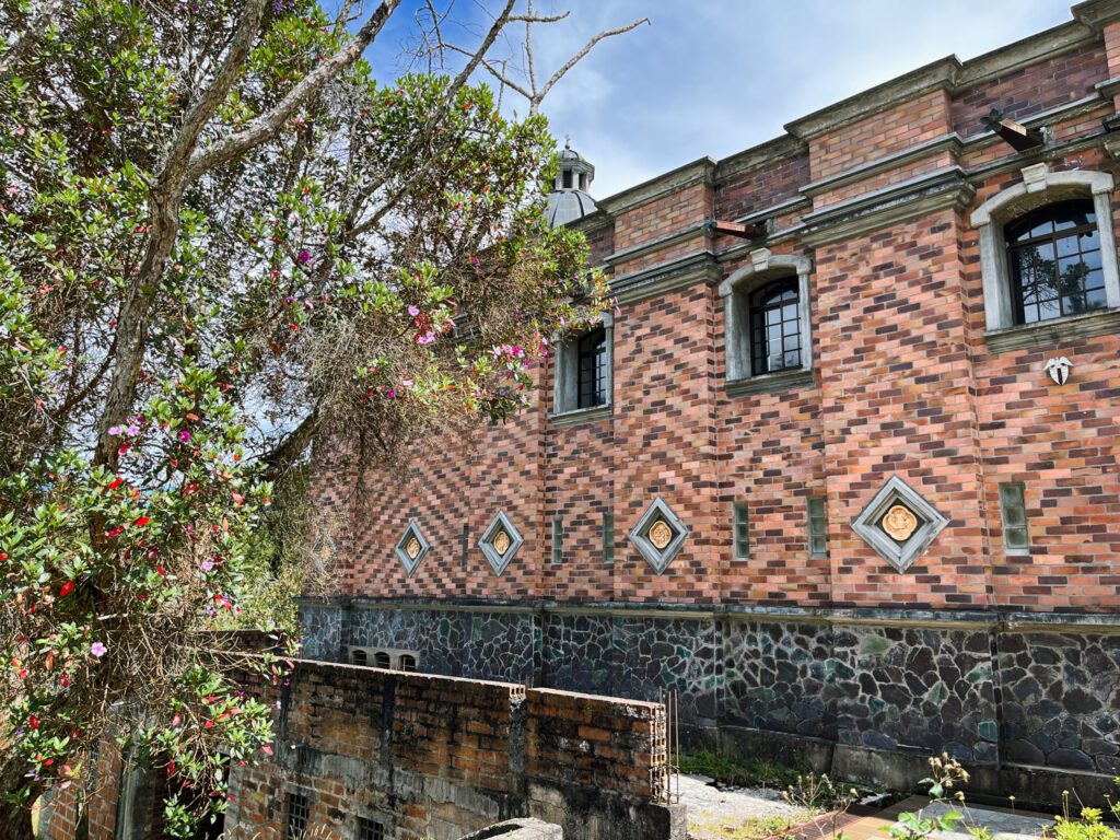 a brick chapel in parque arvi, colombia